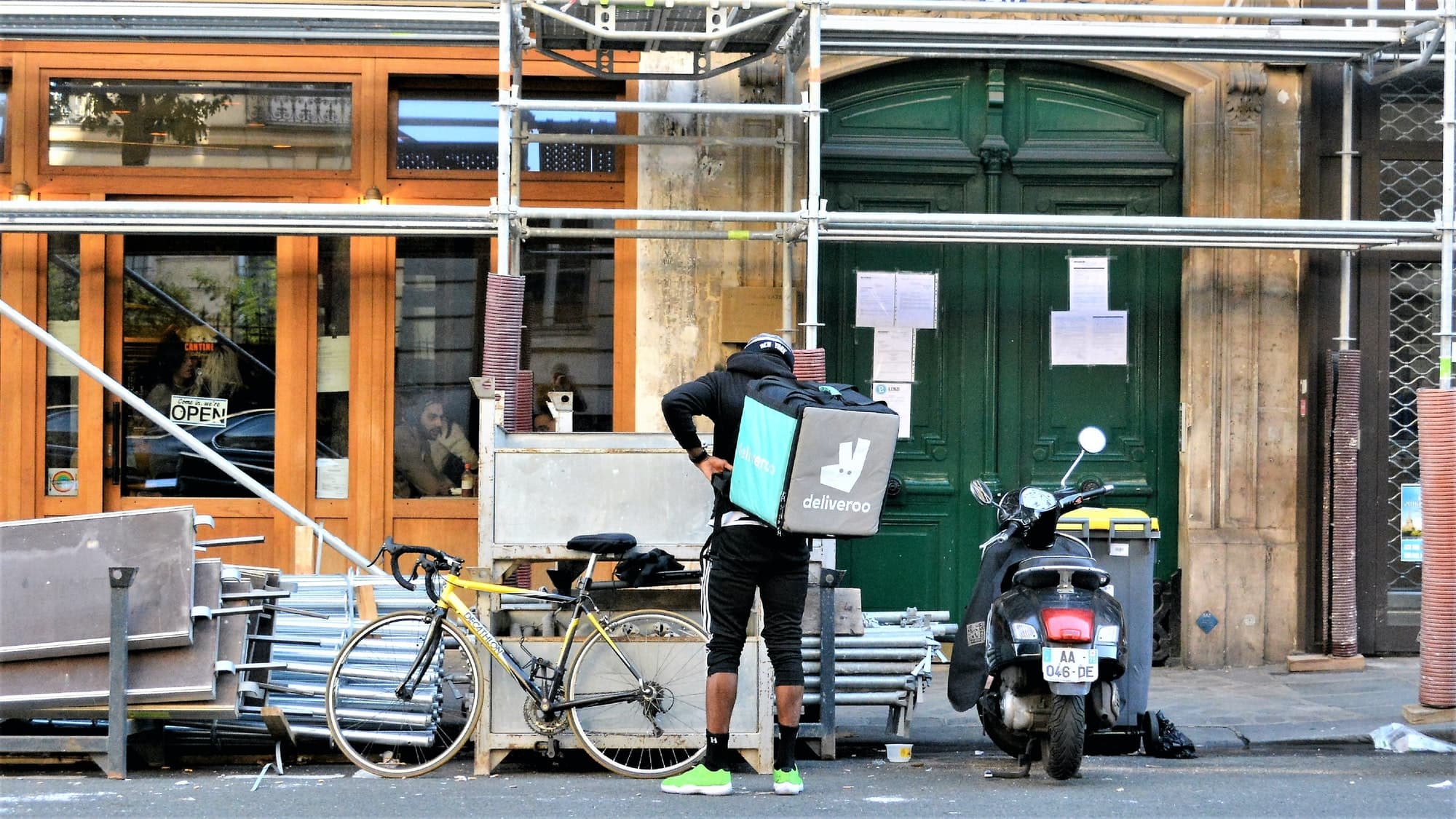 Food delivery service in Paris's Marais district.